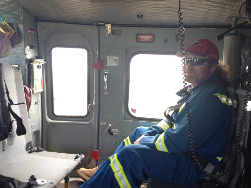 Dr. Court Sandau in a helicopter to travel to wildfire site