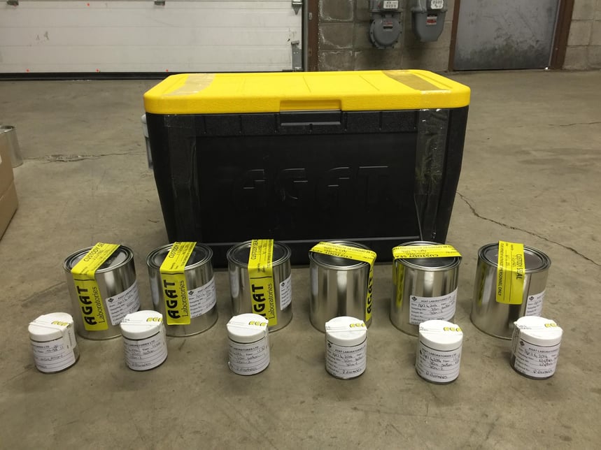 AGAT Cooler with samples lined up and sealed with legal sampling tape. Photograph of samples collected as part of legal investigation showing samples all sealed with tamper proof seals.